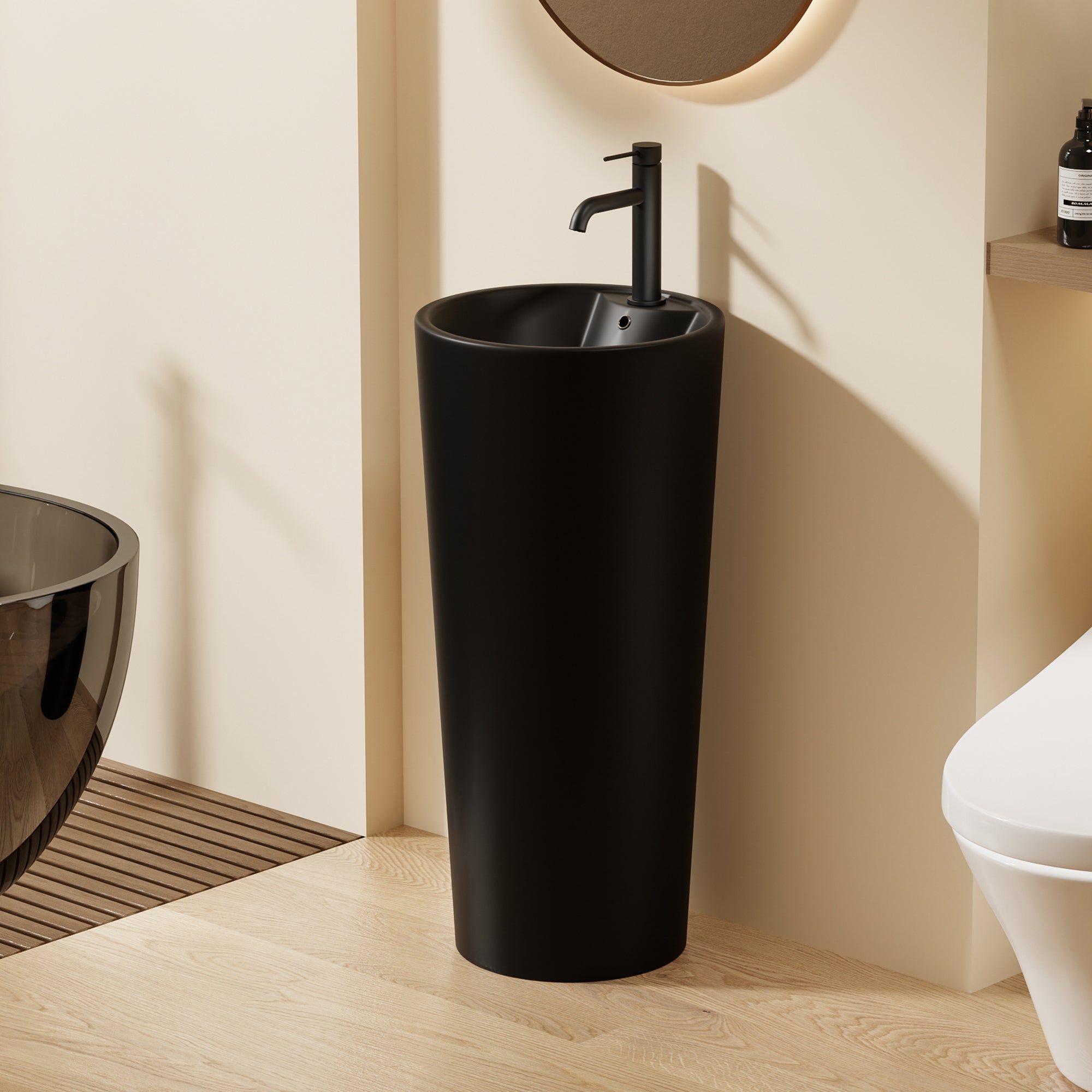 Lavabo Totem Design Rond et Épuré Noir : Lavabo sur colonne noir élégant au design rond moderne, parfait pour les salles de bains contemporaines.