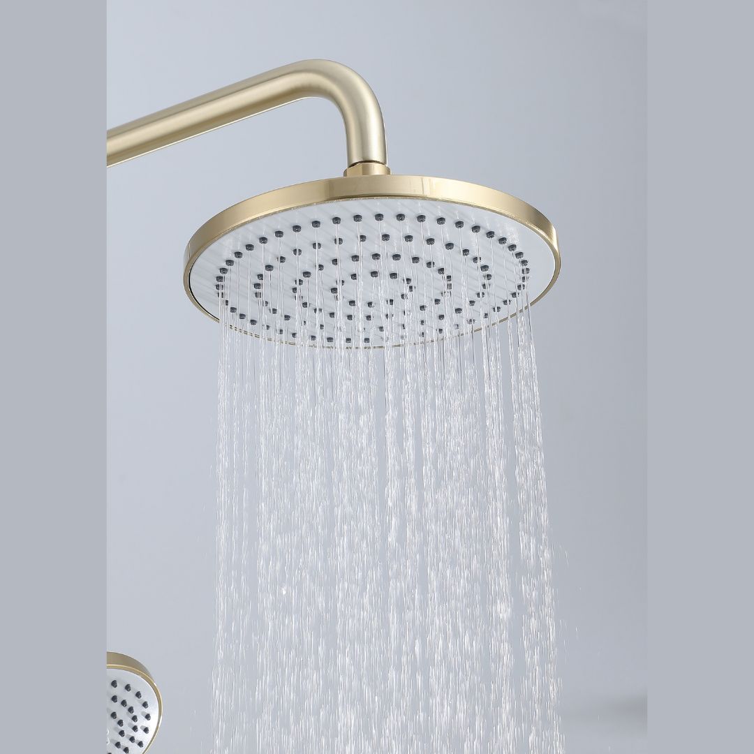 Colonne de douche en or brossé avec pommeau de douche à effet pluie et douchette à main