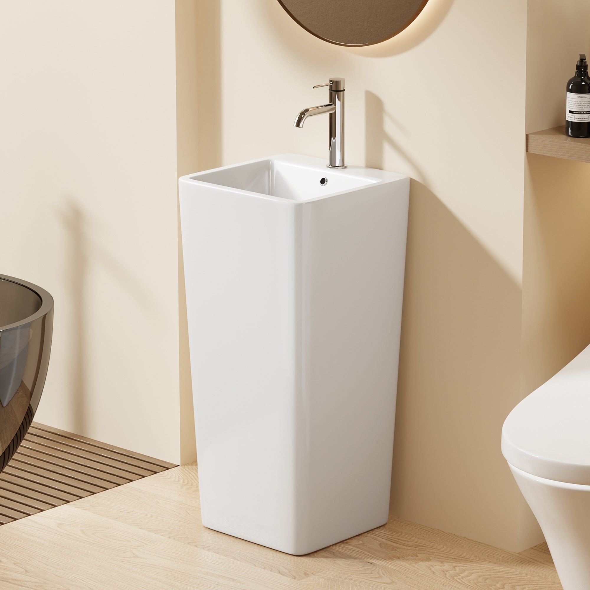 Lavabo Totem blanc carrée arrondie : Élégant lavabo carré sur pied en céramique blanche aux coins arrondis, parfait pour les salles de bains modernes.