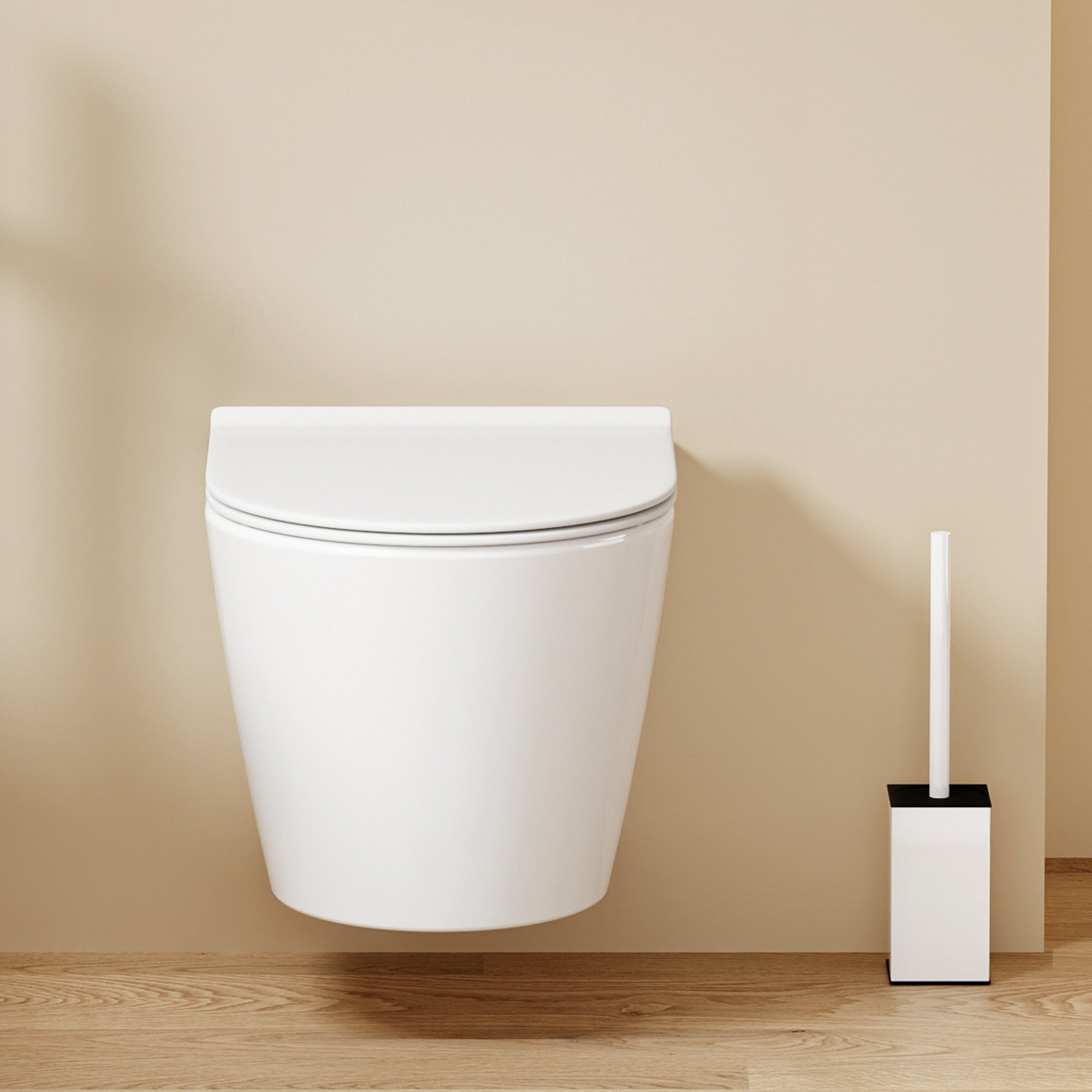 WC suspendu blanc SOLEIL au design moderne, avec abattant Soft Close.
