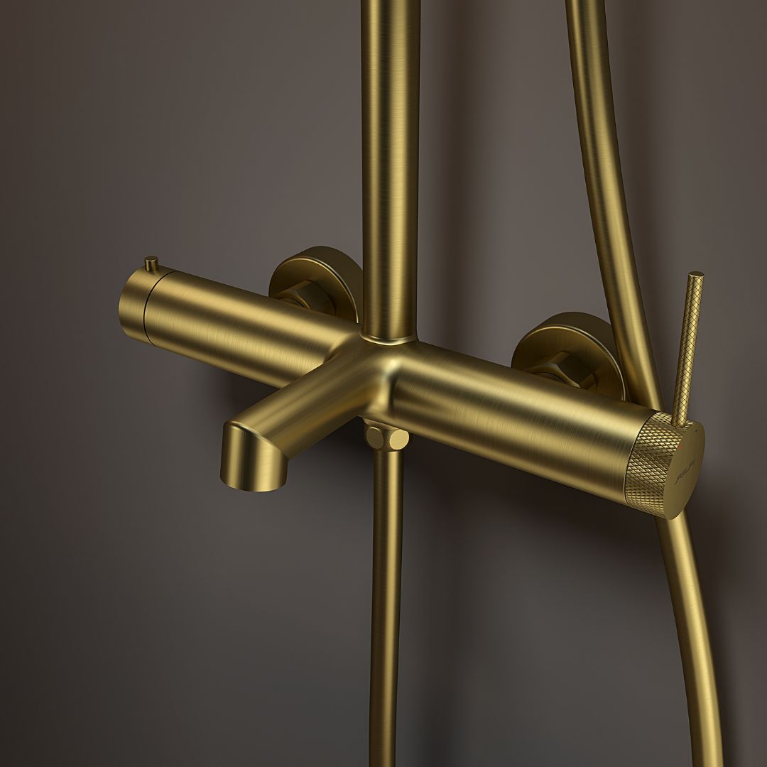 Colonne de douche 3 fonctions Gold : Finition or brossé, design moderne, robinet de douche mural avec inverseur intégré.