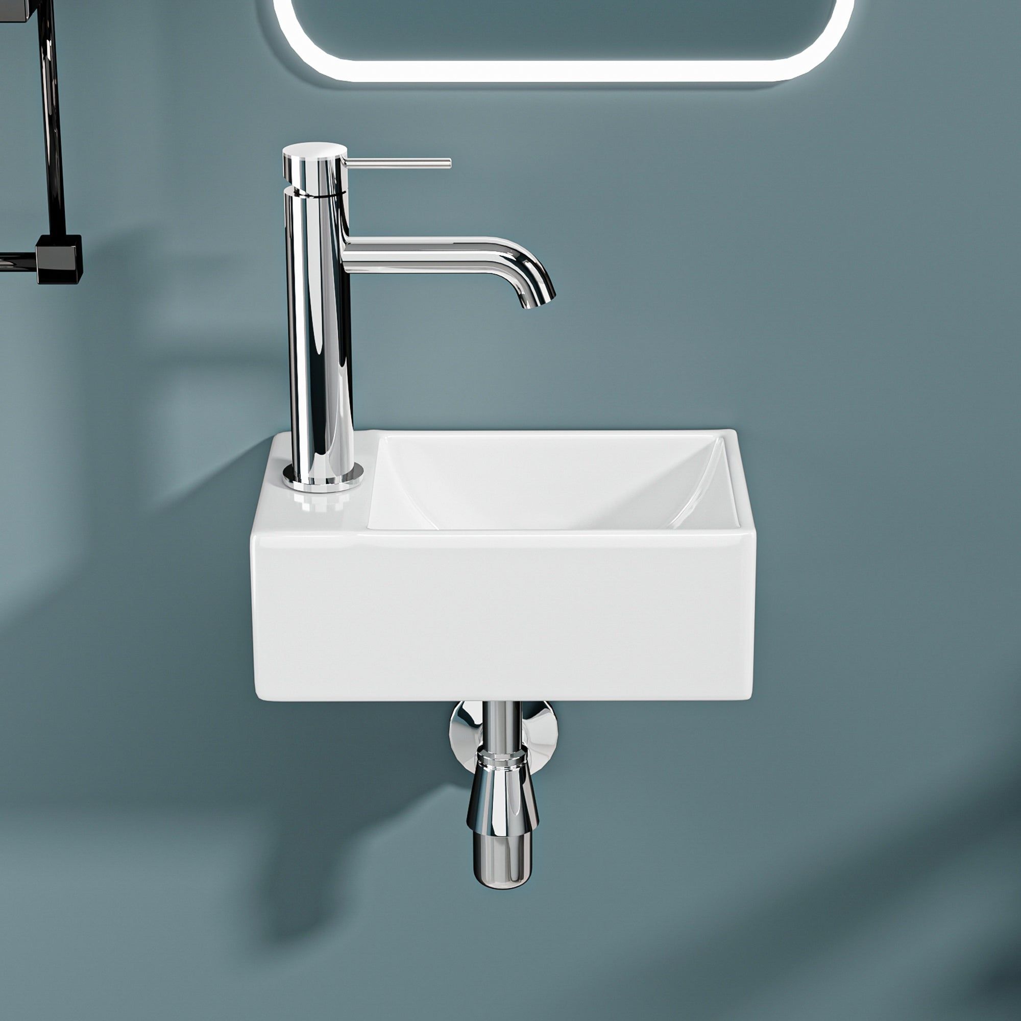 Mini lavabo mural en céramique blanche avec robinet chromé