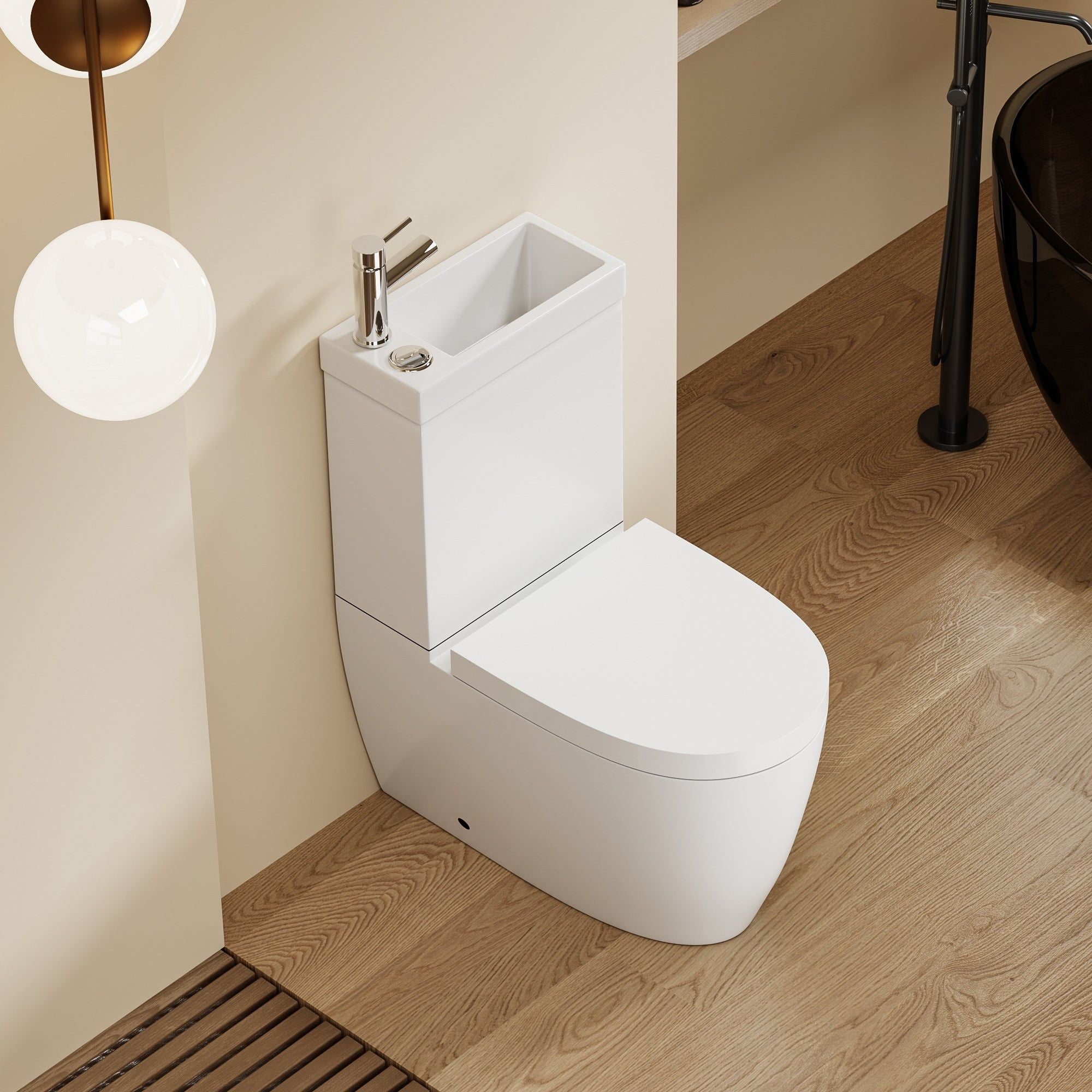 WC 2 en 1 Blanc : Combinaison WC et lavabo tout-en-un peu encombrante avec un design moderne et arrondi.