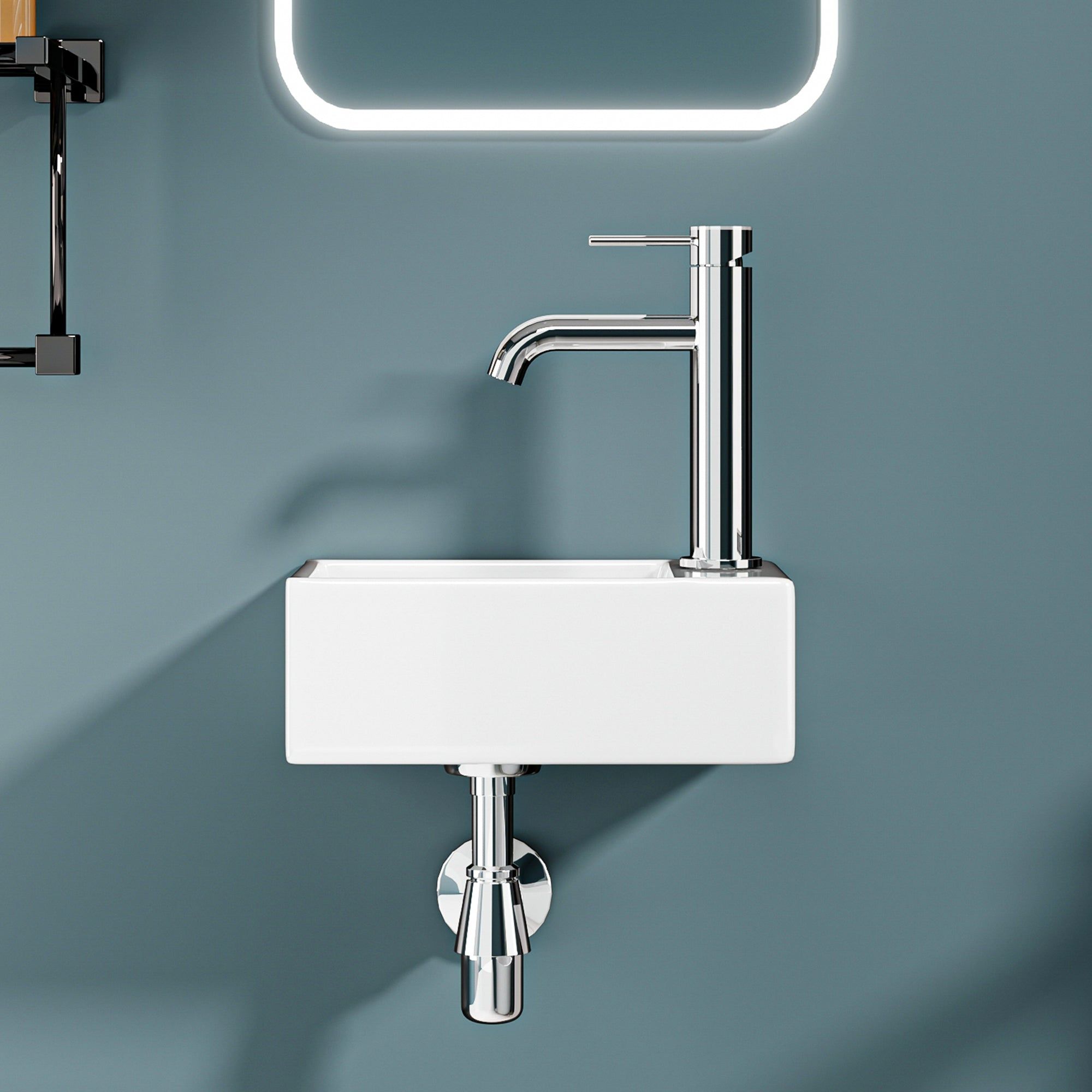 Mini lavabo mural blanc avec robinet chromé. 30x19x11cm.