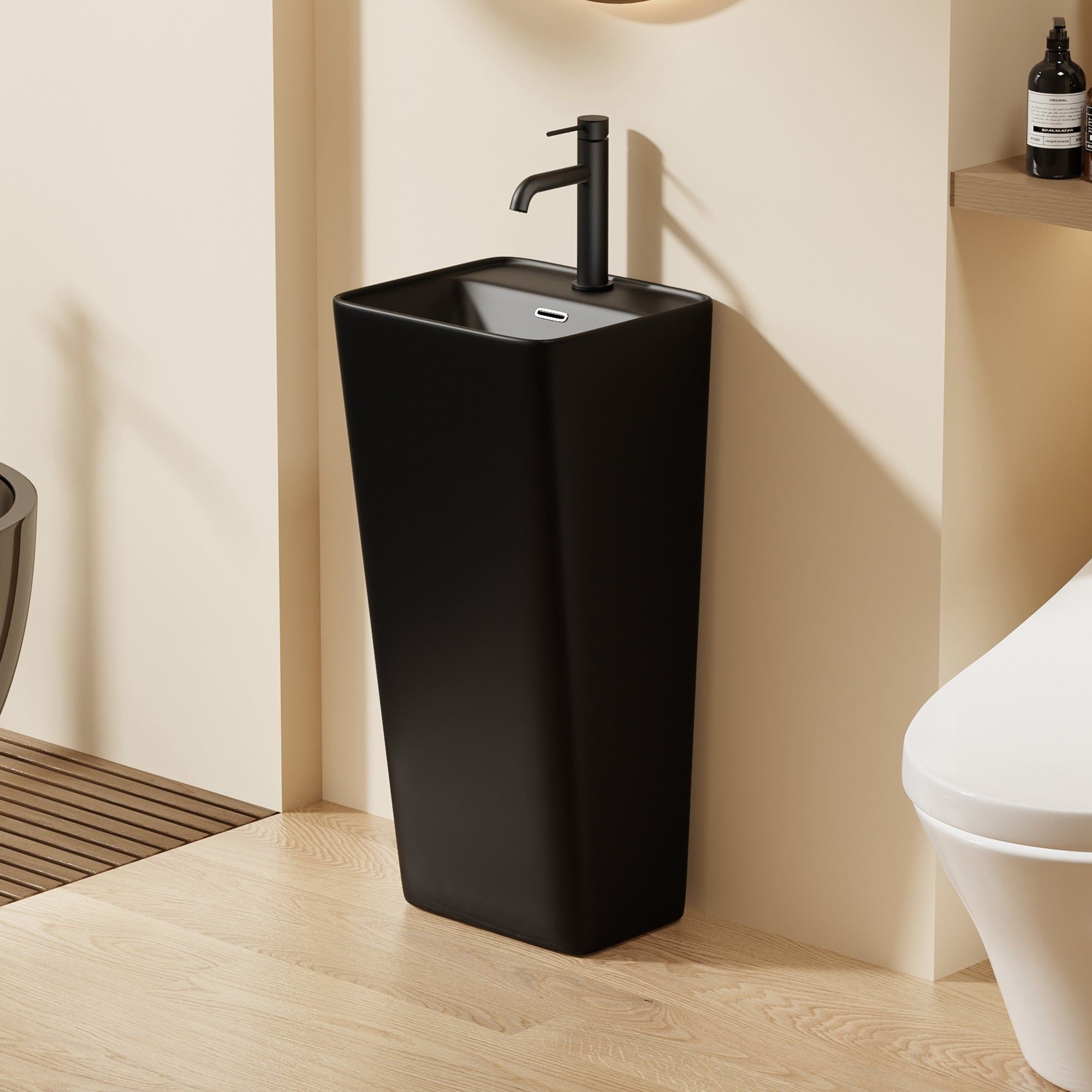 Lavabo Totem Noir Carré : Lavabo de salle de bain sur pied noir moderne avec un design carré et épuré et un robinet minimaliste.