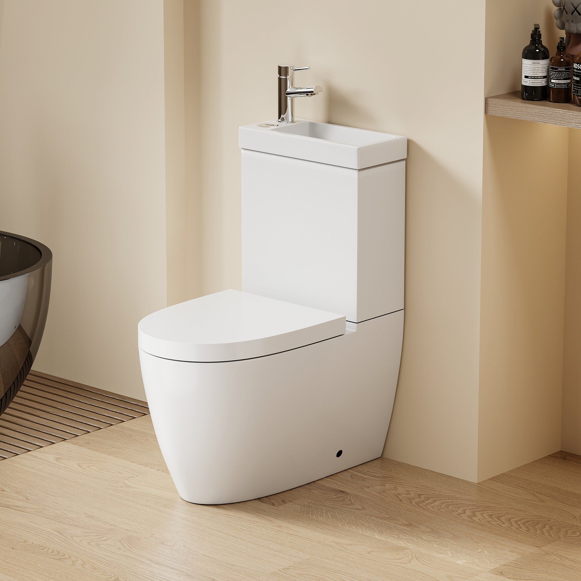 WC 2 en 1 Blanc : WC blanc peu encombrant et meuble vasque intégré au design arrondi contemporain et robinet chromé.