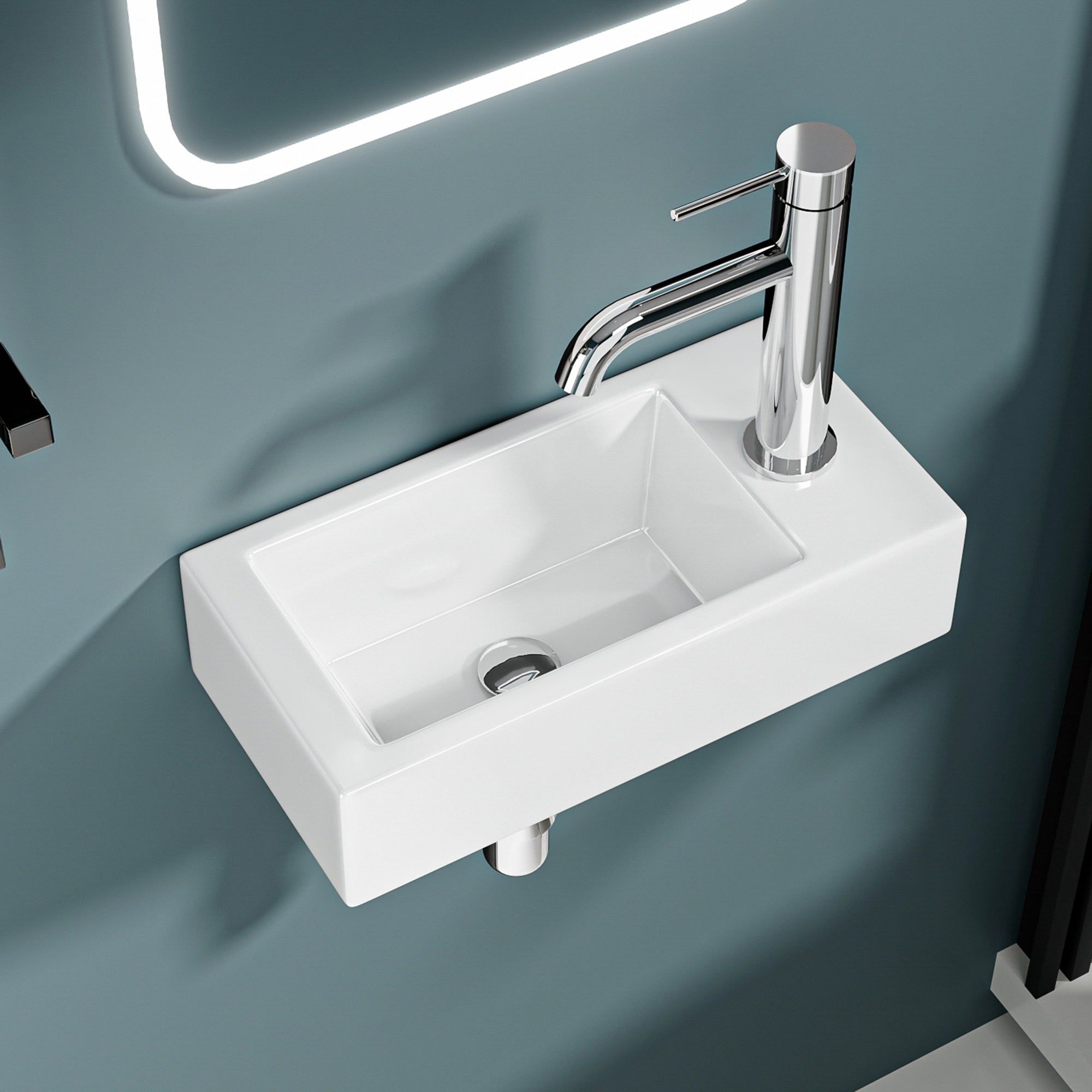 Vasque lave-mains sortie droite : Lavabo mural compact en céramique blanche (36,5x18x9cm) avec robinetterie chromée.