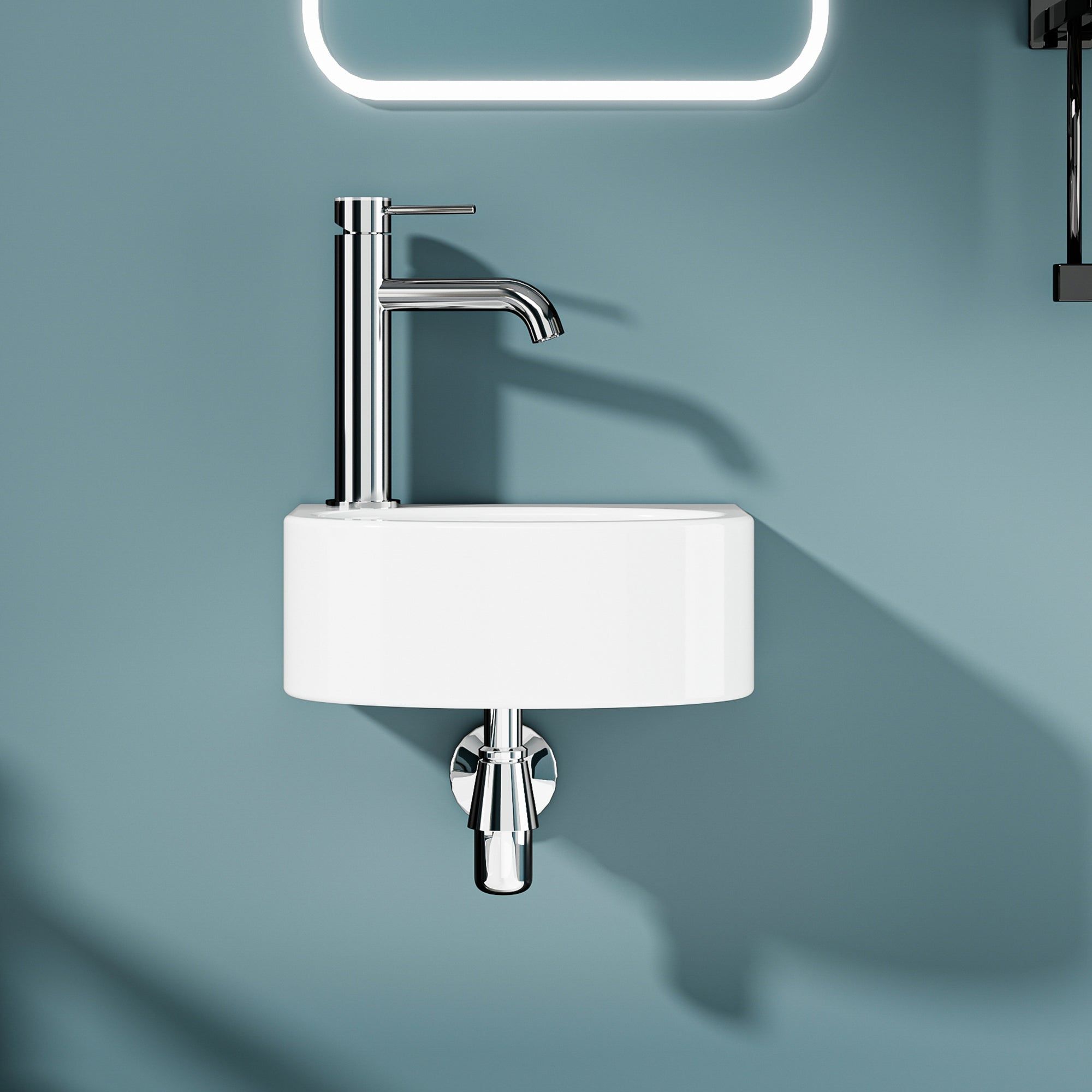 Vasque lave-mains murale LINO en céramique blanc, petite taille 30x23cm, sortie à gauche.
