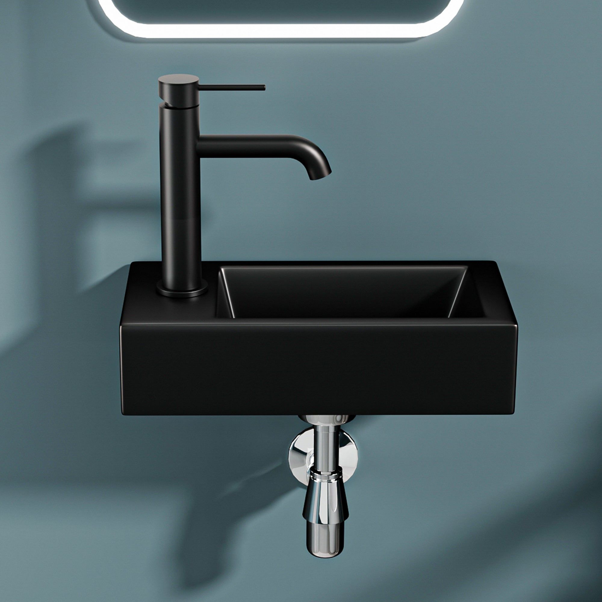 Lavabo mural noir mat avec bonde à gauche et robinet noir moderne. 36,5 x 18 x 9 cm