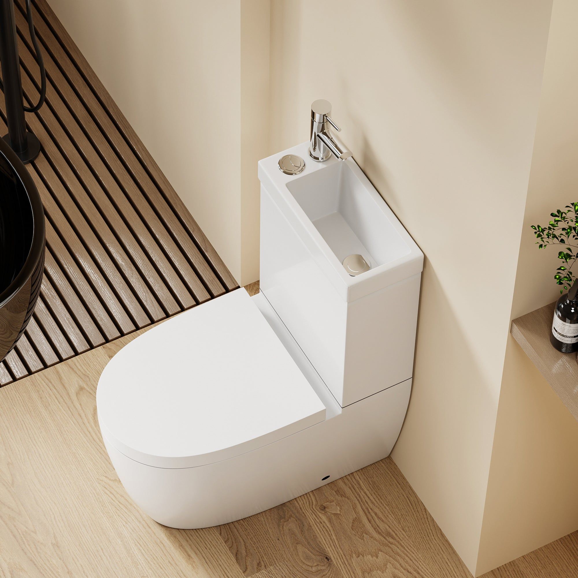 WC 2 en 1 Blanc : WC blanc peu encombrant et lavabo intégré combinés au design arrondi moderne.