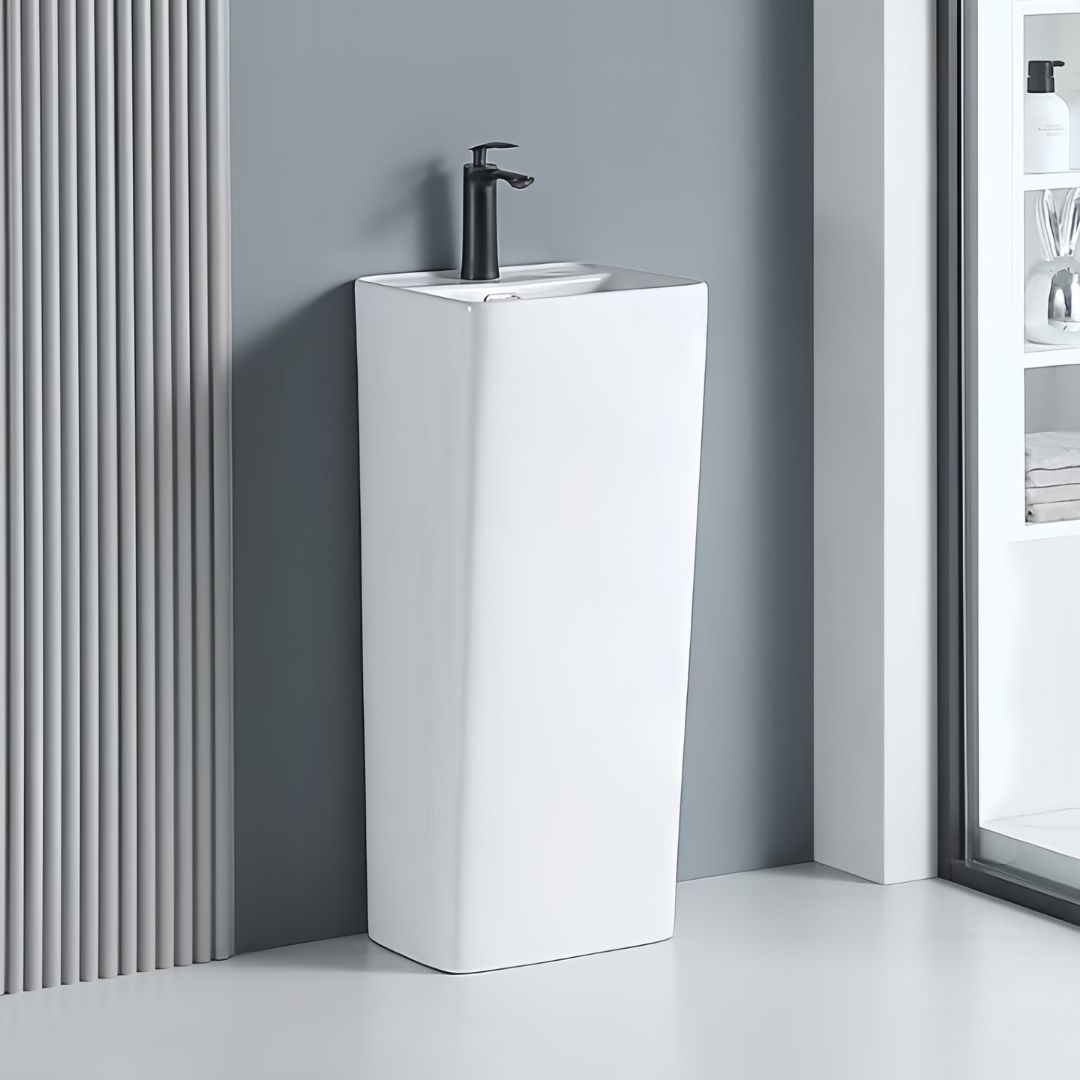 Lavabo Totem Blanc Carré : Lavabo sur pied moderne en céramique blanche avec une vasque carrée et un design épuré, parfait pour une salle de bain contemporaine.