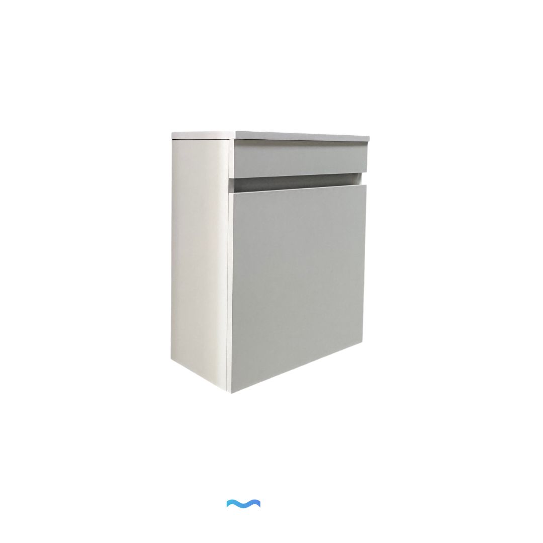 Meuble de salle de bain compact blanc avec lavabo intégré