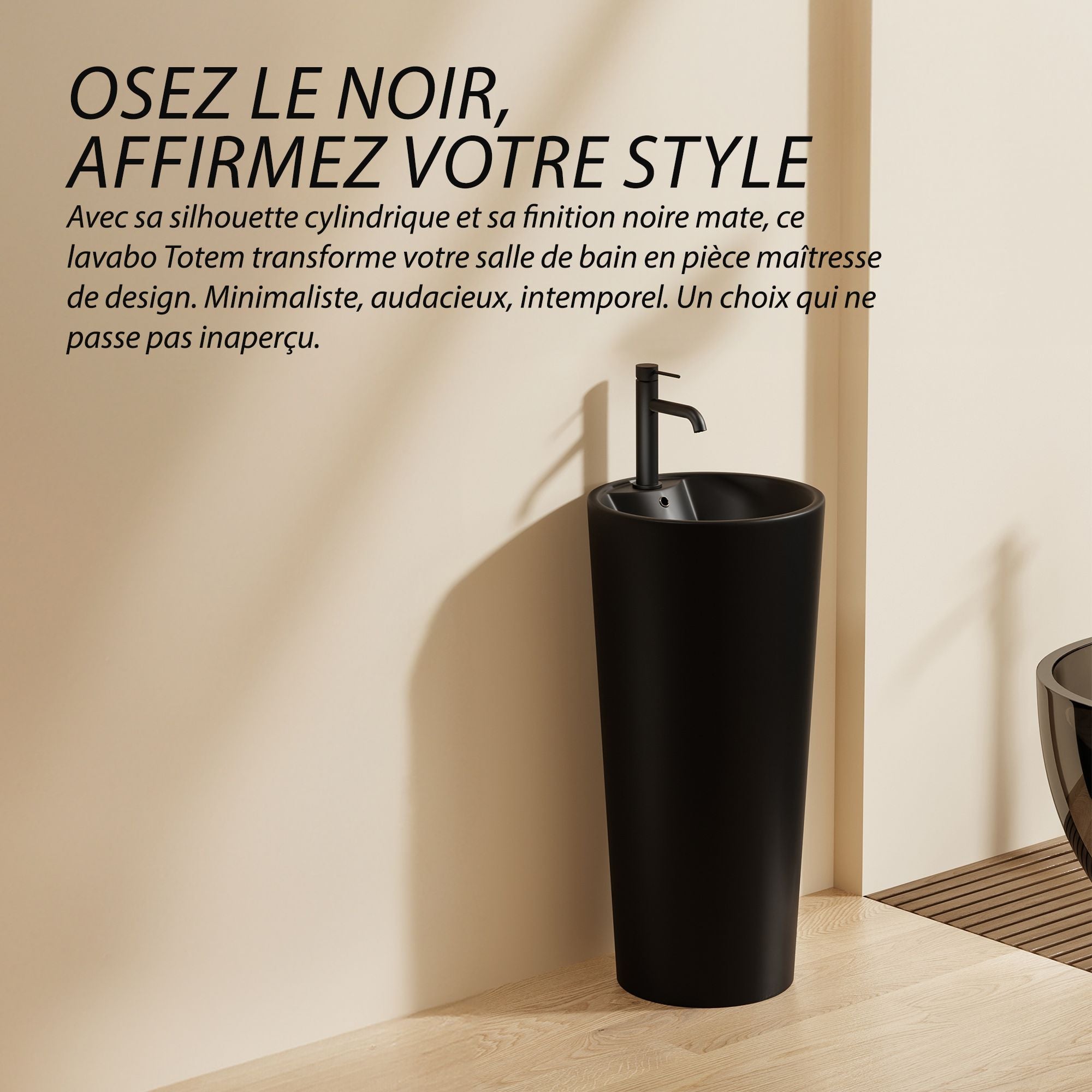 Lavabo Totem Design Rond et Épuré Noir : Lavabo sur colonne minimaliste noir élégant avec une finition mate moderne et un design cylindrique.