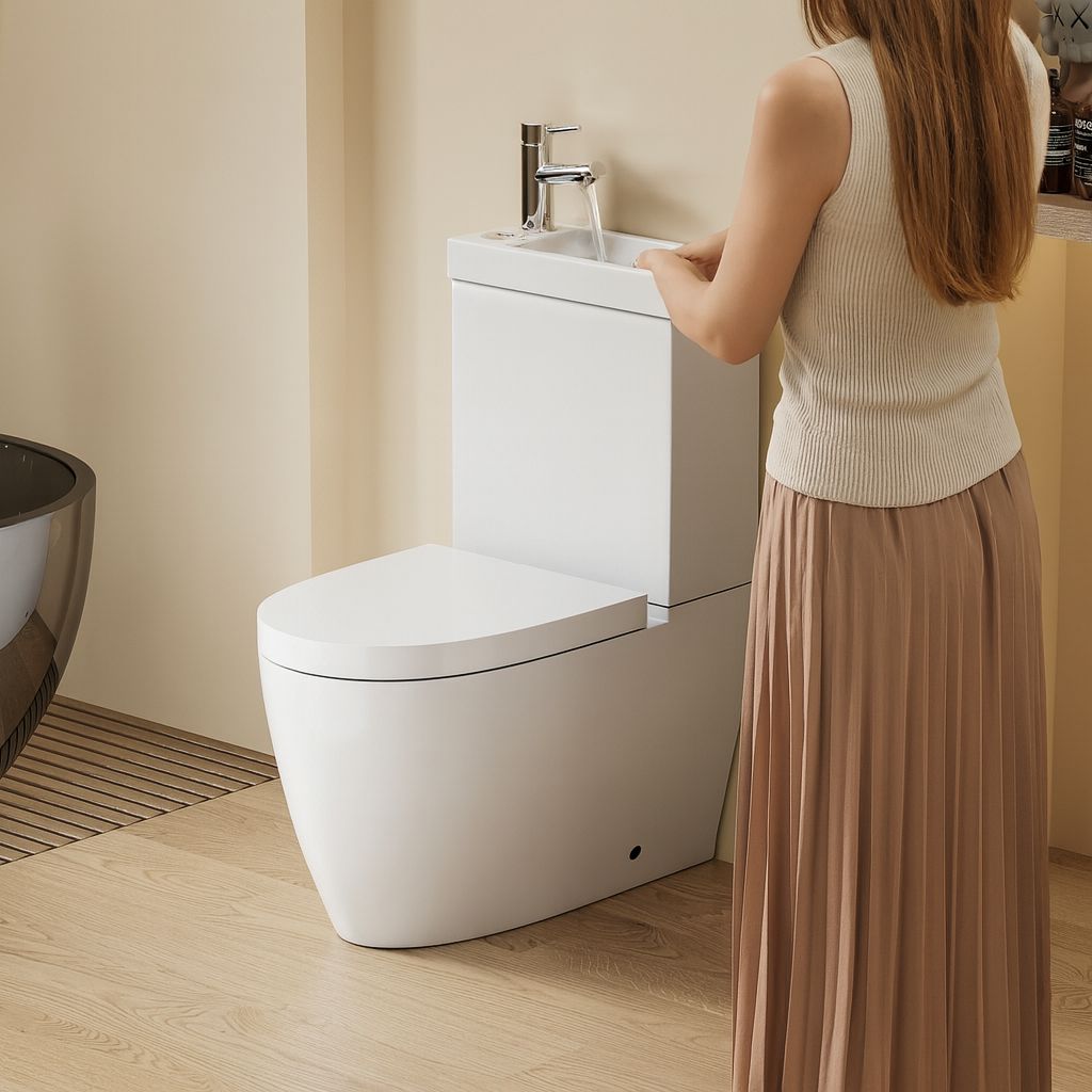WC 2 en 1 Blanc : WC et lavabo blancs modernes et peu encombrants au design arrondi.