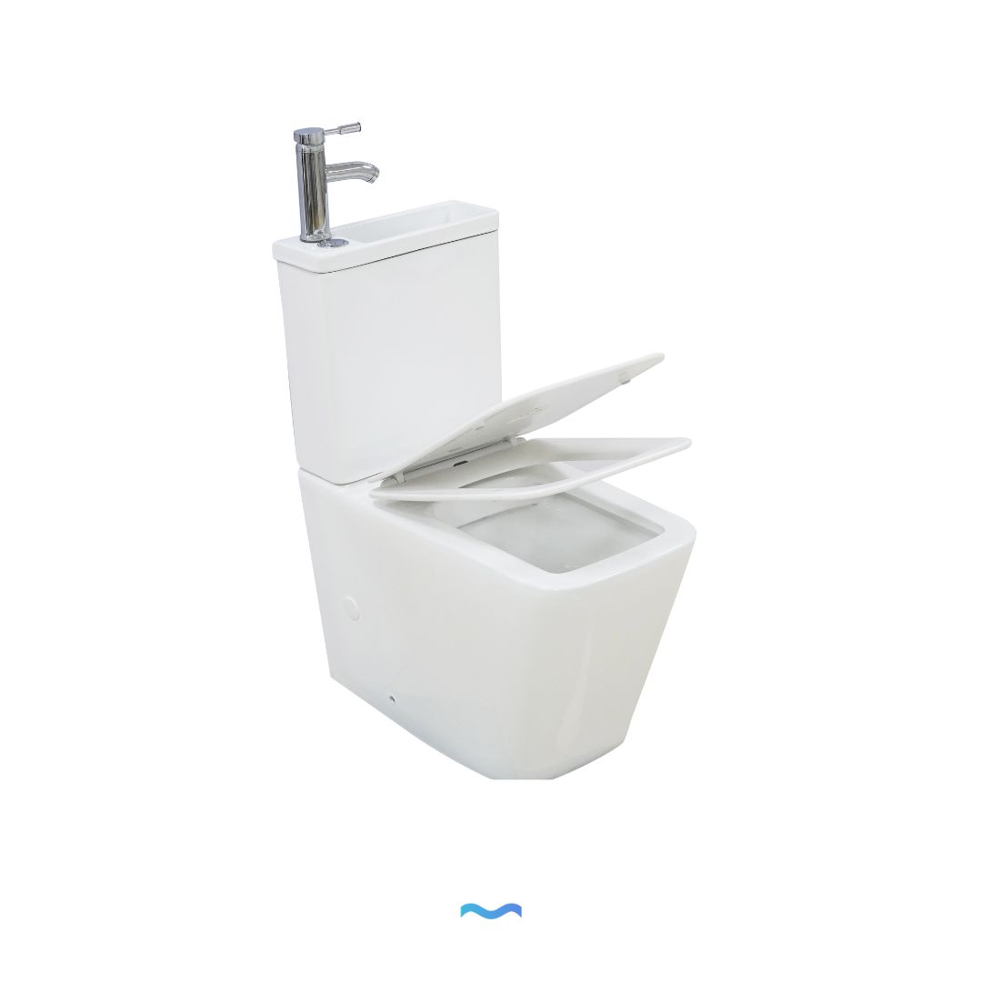 WC à poser avec lave-mains intégré et robinet blanc:  White wall-hung toilet with integrated sink and chrome faucet.