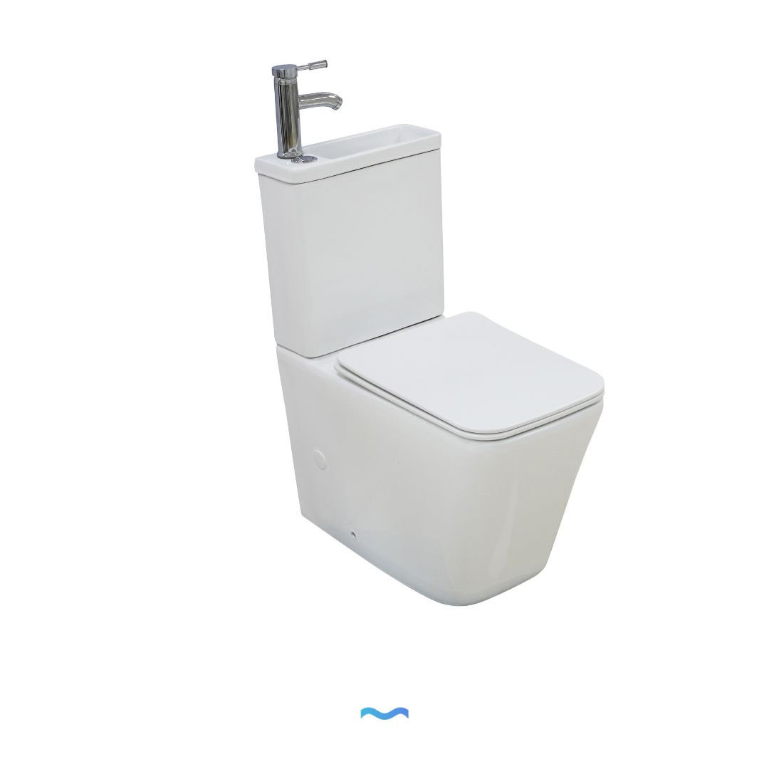 WC à poser avec lave-mains intégré et robinet blanc:  Space-saving wall-hung toilet with integrated sink and chrome faucet.
