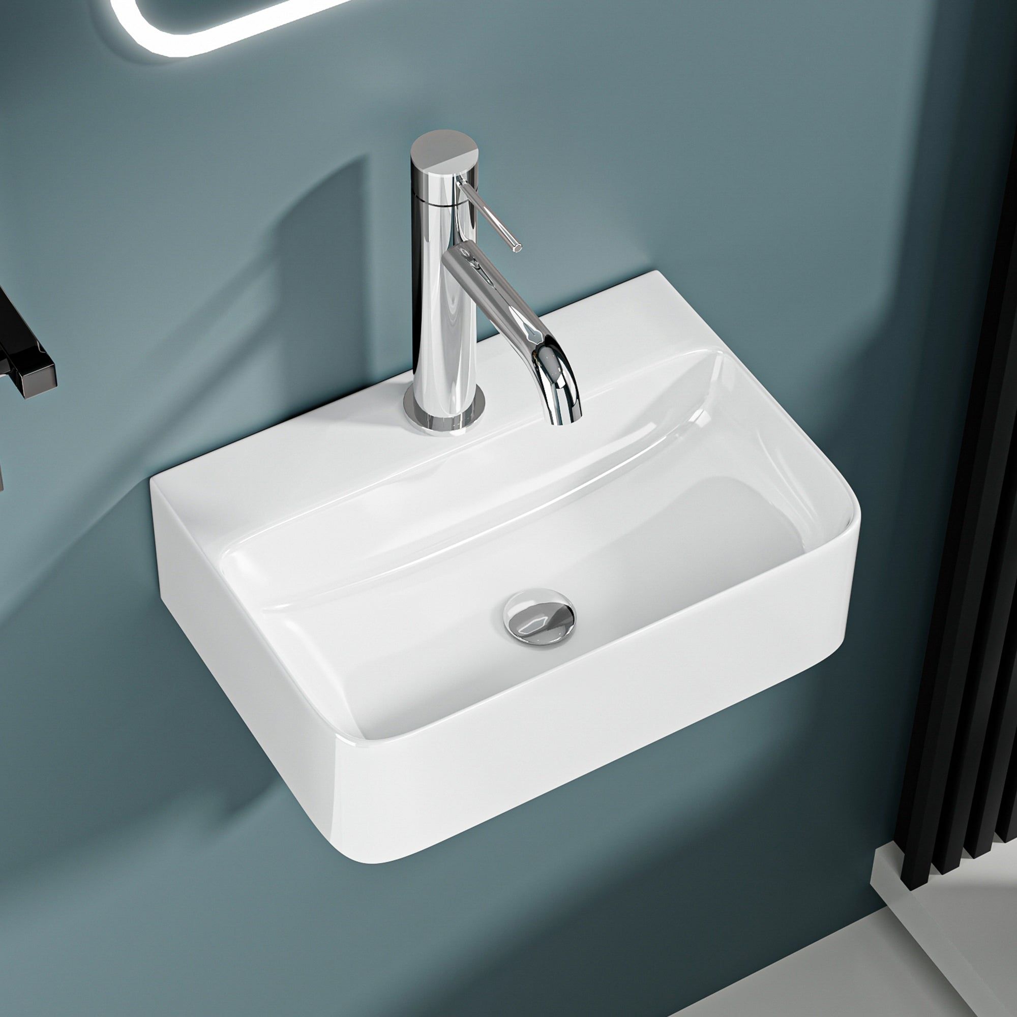 Vasque lave-mains suspendu blanc (36x25x11) : Lavabo mural moderne en céramique blanche avec robinet chromé.