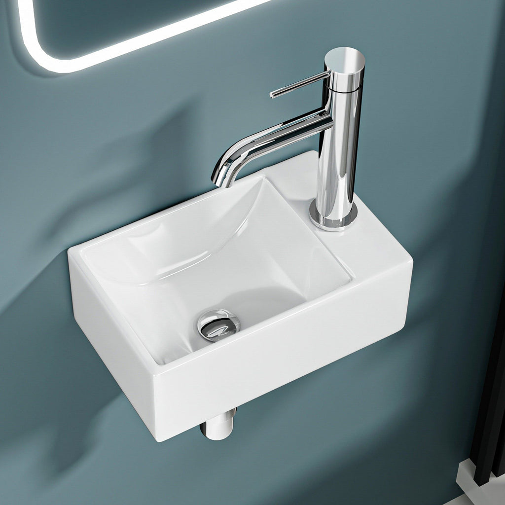 Mini lavabo mural de salle de bain, en céramique blanche, avec robinet chromé. 30x19x11cm.