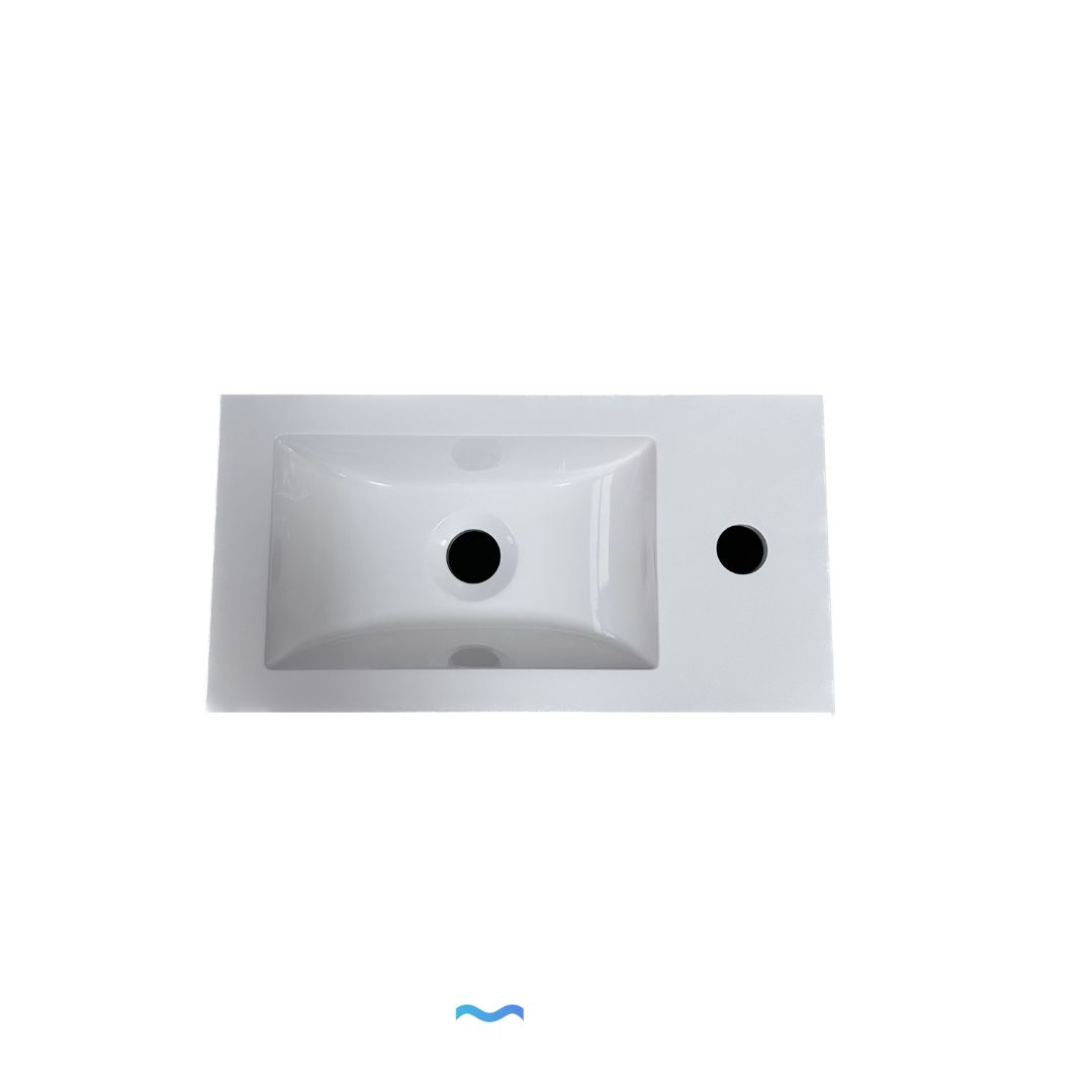 Meuble de salle de bain compact blanc avec lavabo intégré