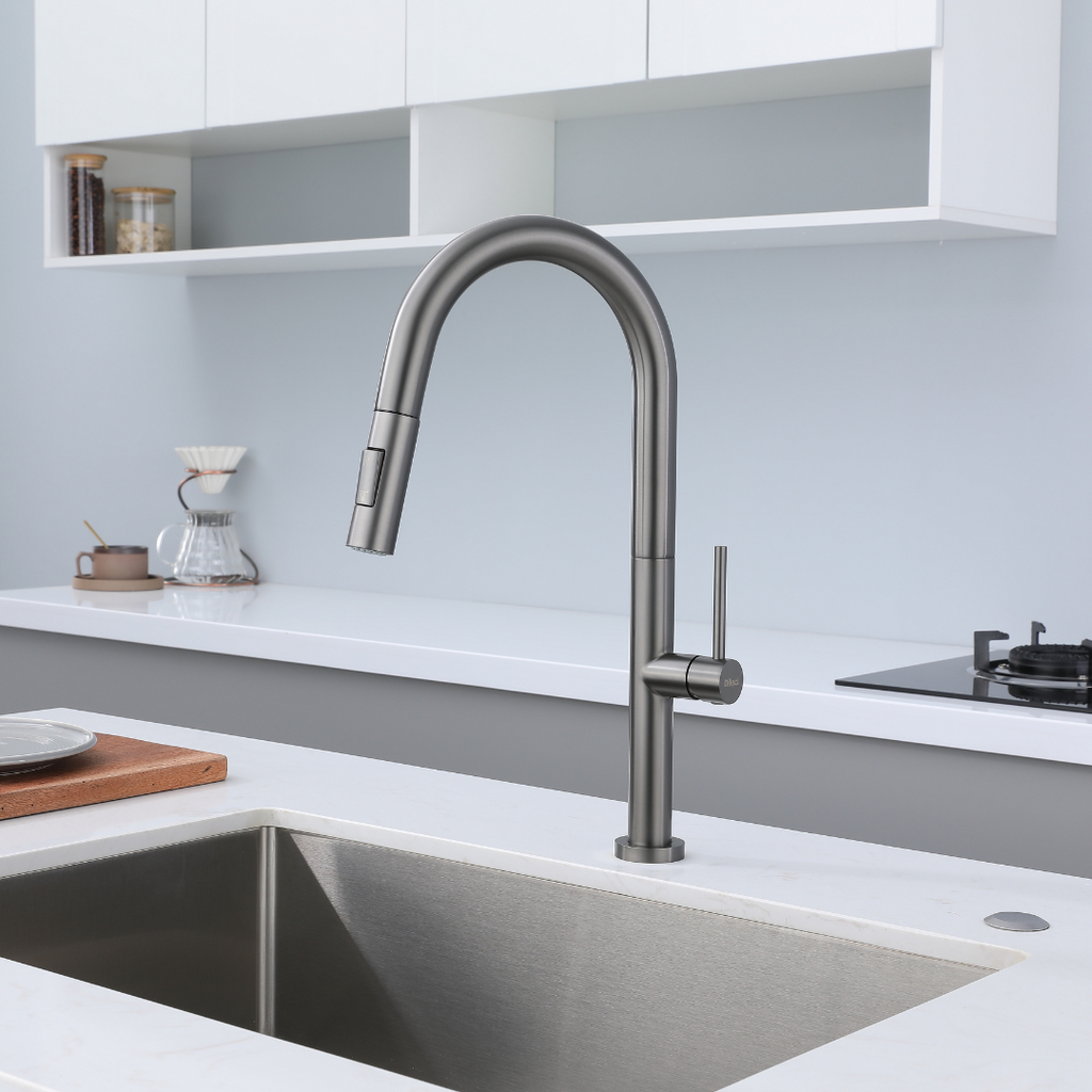 Metallic gray pull-down kitchen faucet with high arc spout and single lever handle.  Robinet de cuisine avec Douchette Extractible gris metallique