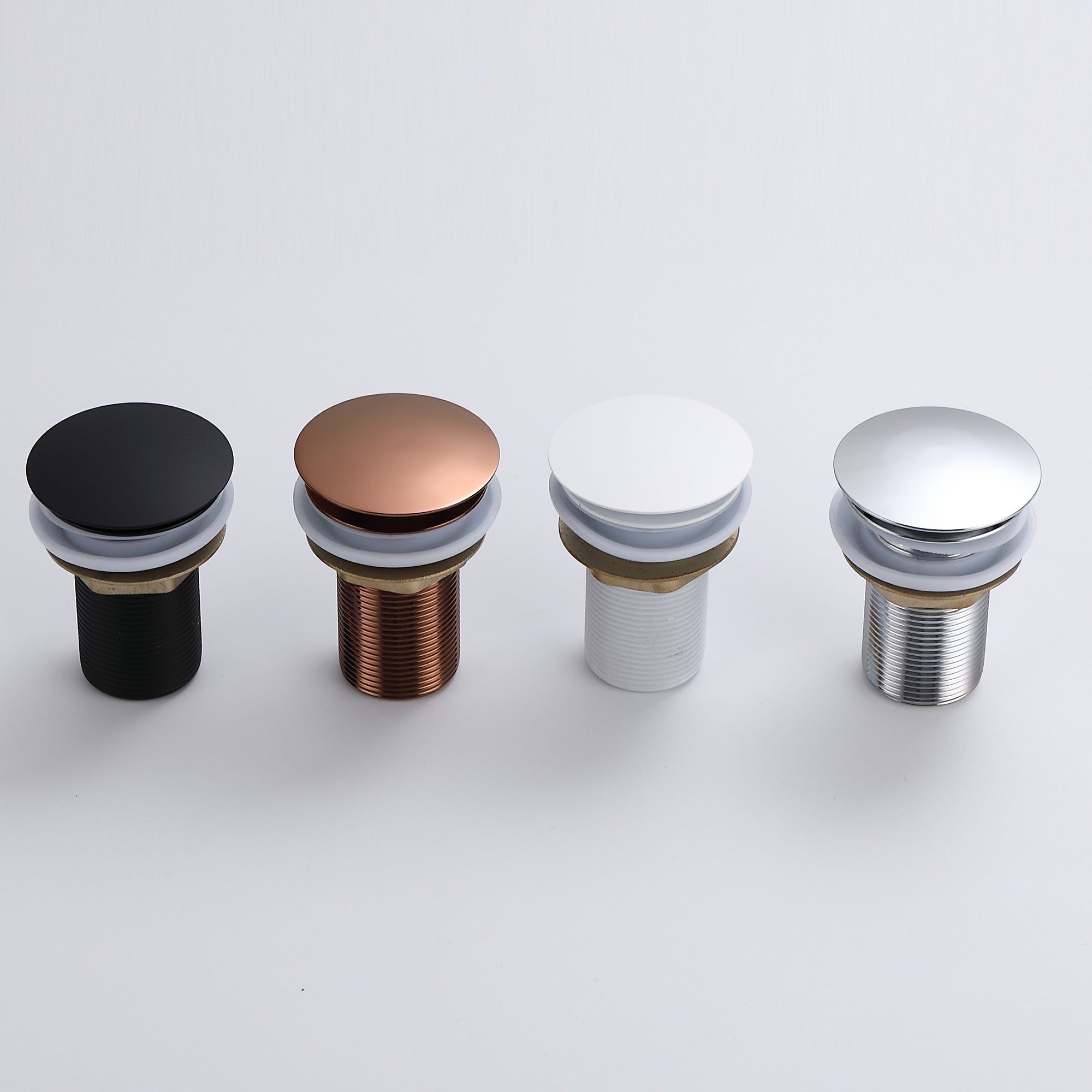 Bonde clic-clac cuivre/laiton : Ensemble de quatre bondes de lavabo clic-clac élégantes aux finitions noir, cuivre, blanc et chrome.