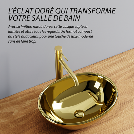 Lavabo ovale doré (41,5 x 33,5 cm), design moderne et luxueux. Finition or brillant, format compact.