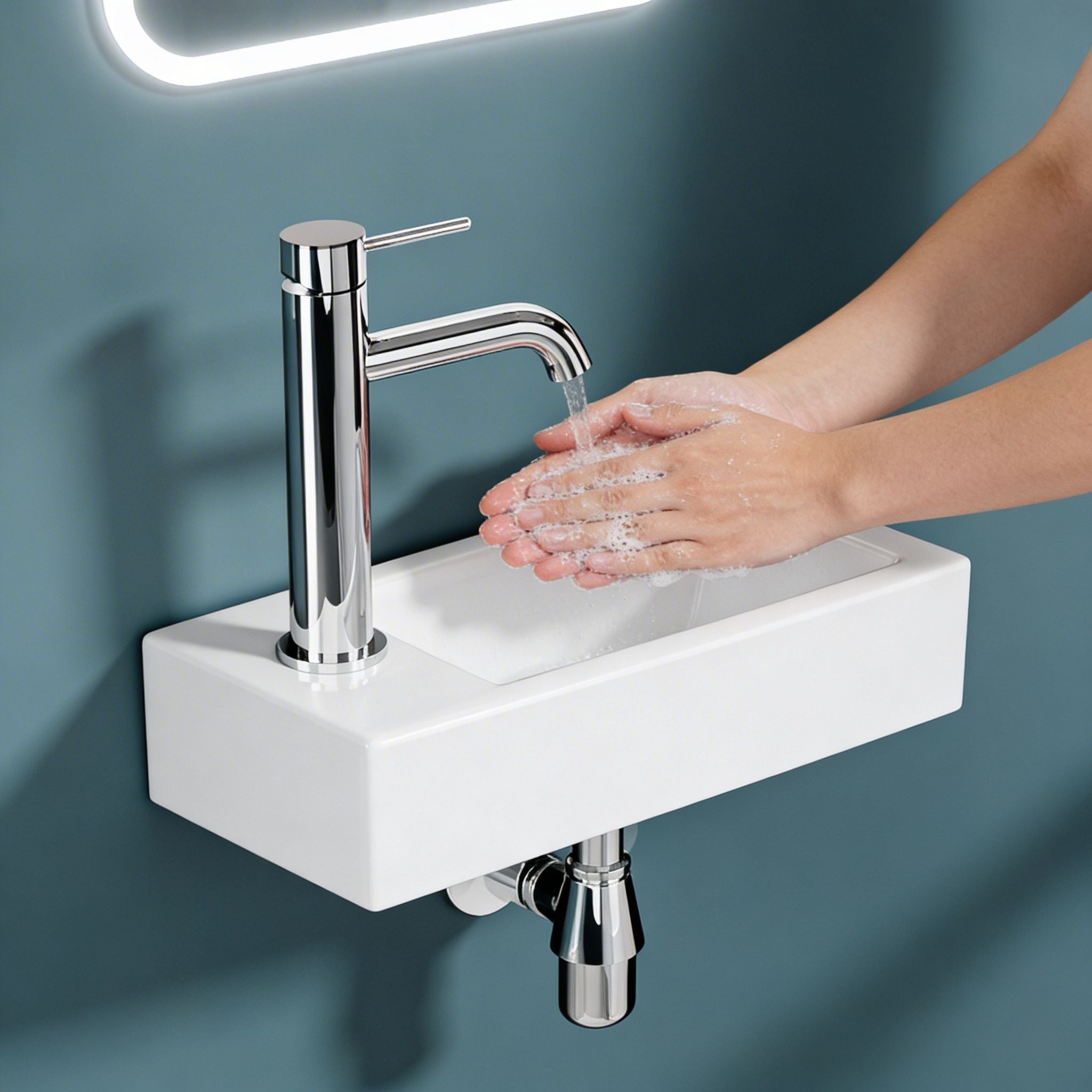 Vasque lave-mains sortie gauche 36,5x18x9cm, design compact et moderne en céramique blanche